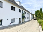Tiefgaragenzufahrt - 2 Zimmer mit Stil & Qualität