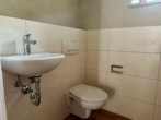 Gäste-WC - Großzügiges Einfamilienhaus mit Wintergarten, zwei Terrassen und großem Garten!