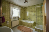 Einfamilienhaus mit grüner Oase - Einliegerwohnung inklusive! - Badezimmer