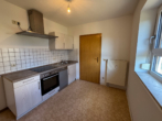 Küche - Hell, grün, zentral. Ruhige 2-Zimmer-Erdgeschosswohnung im „Sonnenpark“