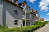 Südwestansicht - Hell, grün, zentral. Ruhige 2-Zimmer-Erdgeschosswohnung im „Sonnenpark“