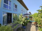 Bild - Großzügige 4 Zi. Whg. als Reihenmittelhaus mit Garten und Terrasse, EBK, 2 TG´s uvm.