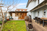 Terrasse - 5-Zimmer-Wohnung mit Garten, Carport und separatem Büro