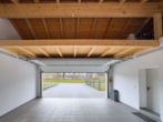 Garage - Neuwertiges A+ Effizienzhaus mit Einliegerwohnung, PV-Anlage und Smart Home in Nittenau (Stefling)