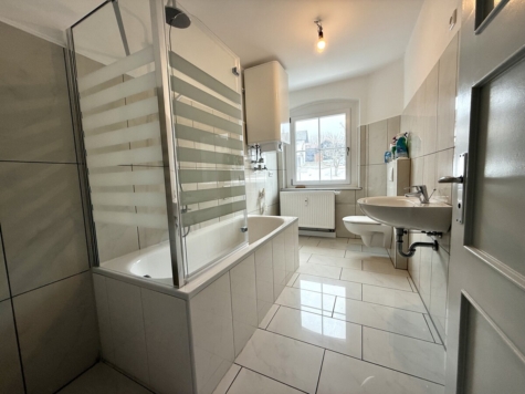 Kernsaniert: 3-Zimmer-Wohnung mit Garage und gemeinschaftlichem Garten - Photo 4