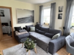 Wohnzimmer - Besonders schöne 2-Zi-Wohnung auf Erbpachtgrundstück