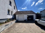 Garagen - Renditestarkes Anlageobjekt: Vermietetes Zweifamilienhaus in Hohenfels!