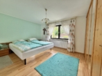 EG - Großzügiges Einfamilienhaus mit Einliegerwohnung, Sauna & Gartenidylle in Zeitlarn-Laub