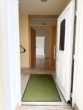 Hauseingang - Ruhig gelegene 3-Zimmer-Wohnung mit Terrasse, Garten und Garage