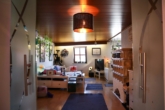 Wohnzimmer im OG - Die besondere Immobilie mit südländischen Flair, viel Platz und vielen Möglichkeiten!
