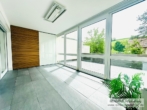 Wintergarten - Moderne 3,5-Zimmer-Wohnung mit Süd-Dachterrasse & Garage — Zentrumsnah in Deggendorf zur Miete!