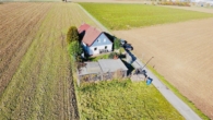 Drohnenaufnahmen - Liebevolles Einfamilienhaus in ruhiger Ortsrandlage