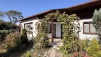 Hausansicht mit Garten Ki optimiert