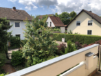 Blick vom Balkon - Großzügiges Wohnen in der Stadt – in Ihrem eigenen Haus mit Garten!