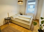 Schlafzimmer - Charmante 3-Zimmer-Wohnung in der Altstadt von Regensburg